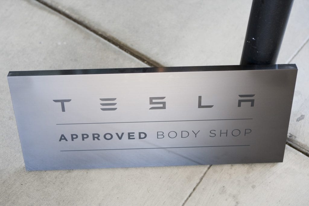 Tesla Approved Body Shop sign