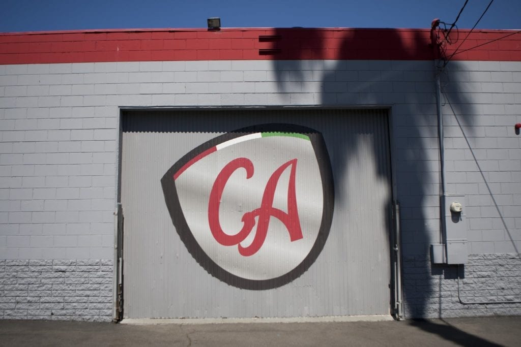 exterior view of garage with CA logo on the door